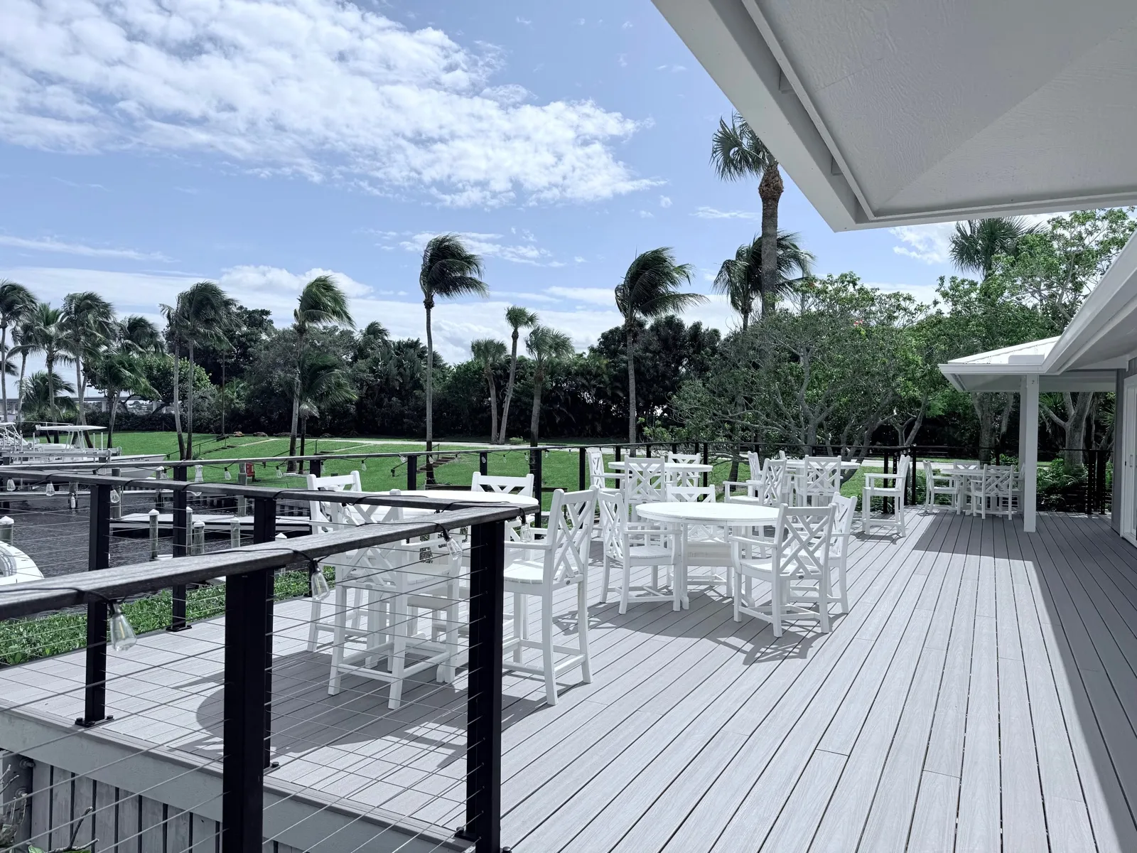 The clubhouse deck with waterfront dining overlooking the marina